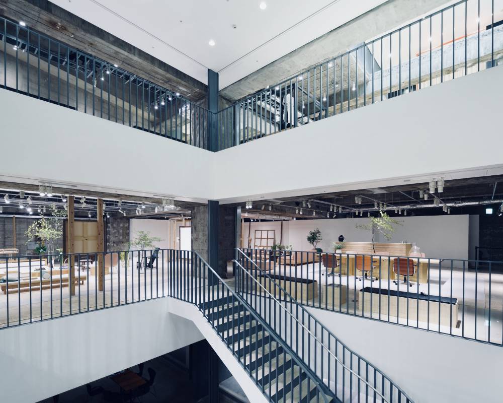 Interior. Lighting from above has been juxtaposed into the three-level underground atrium.