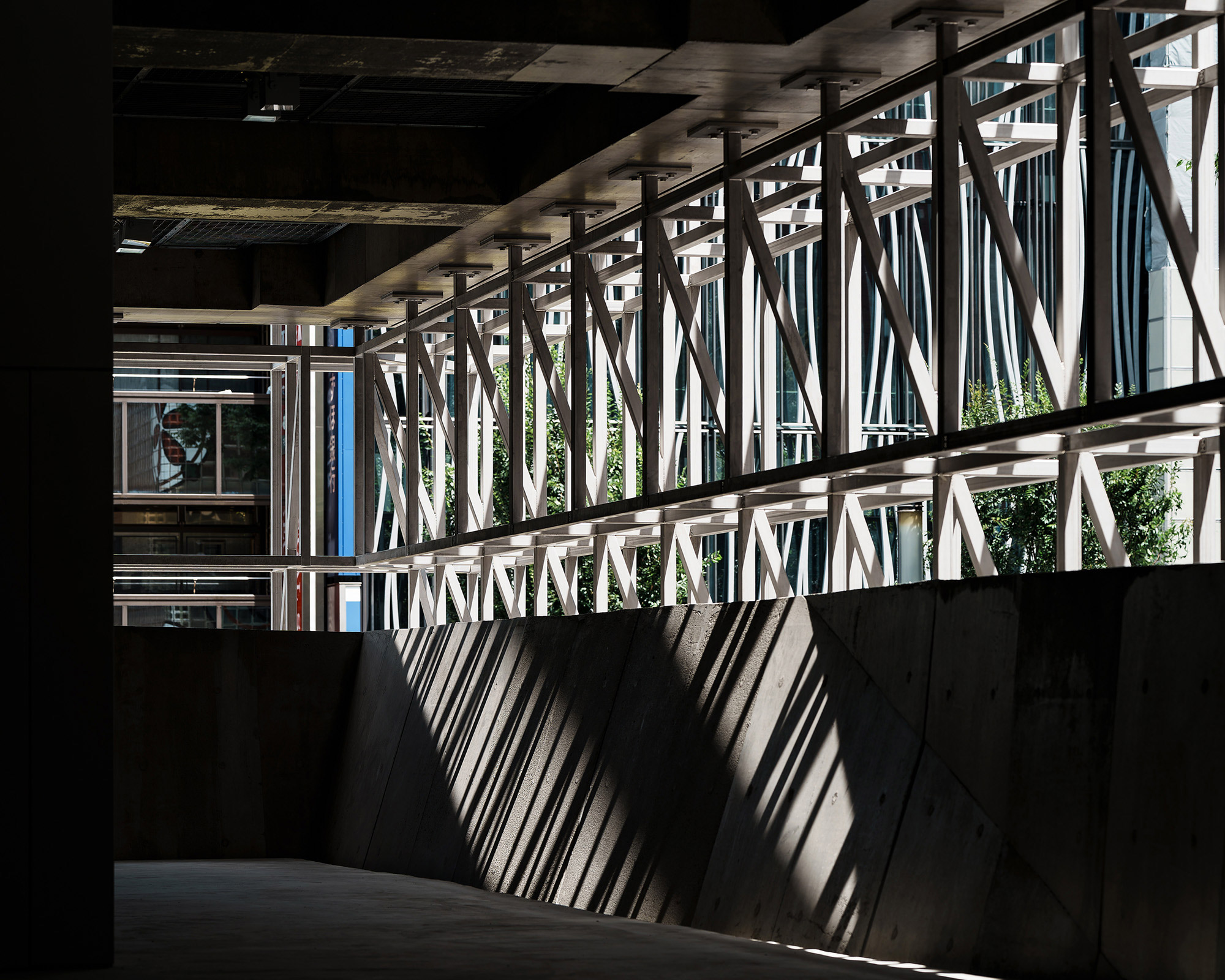 Interior. Designed for sunlight and shadows to show through the grid-like façade.