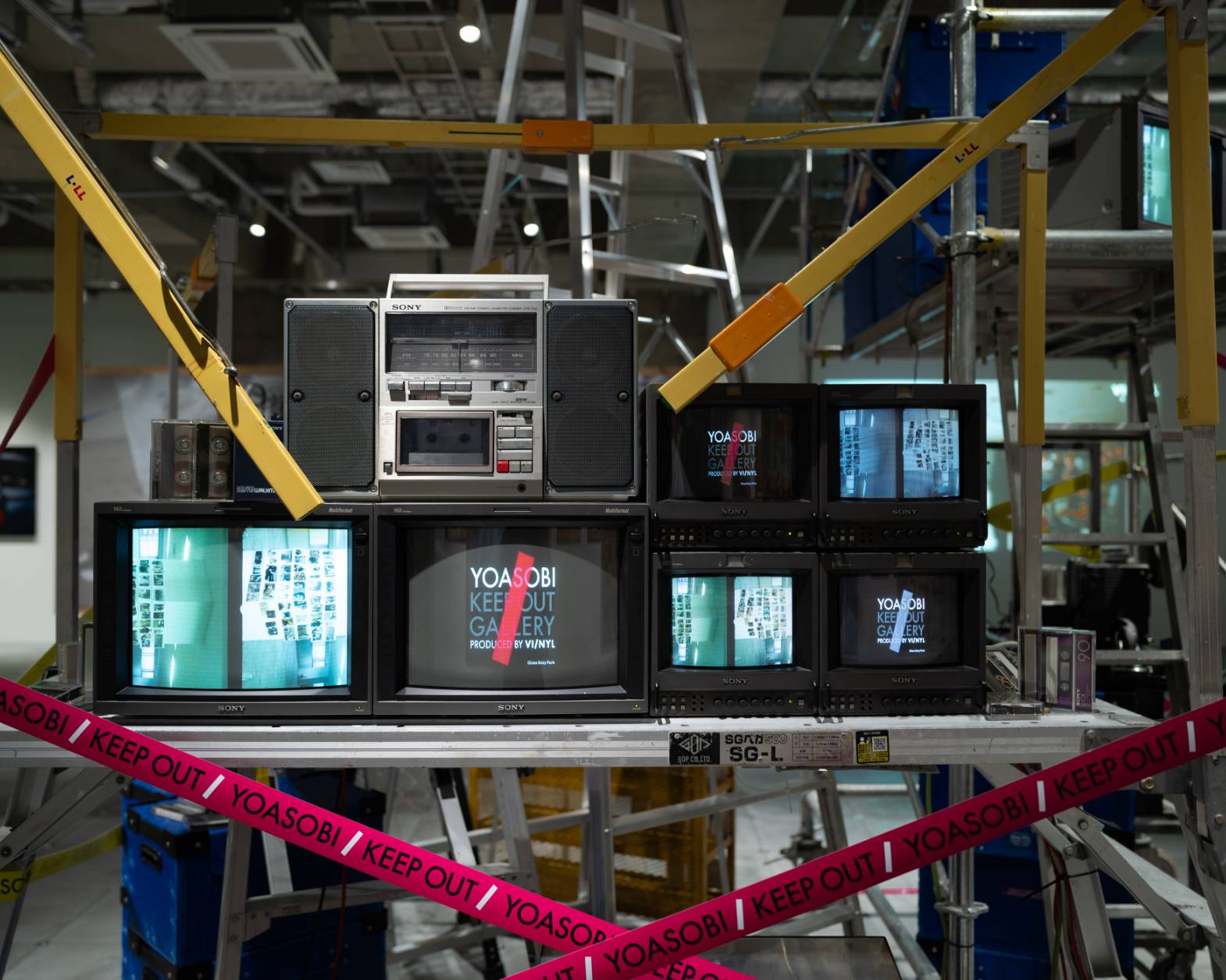 Sony-made radio cassette recorders, cathode-ray tube TVs, and other props.