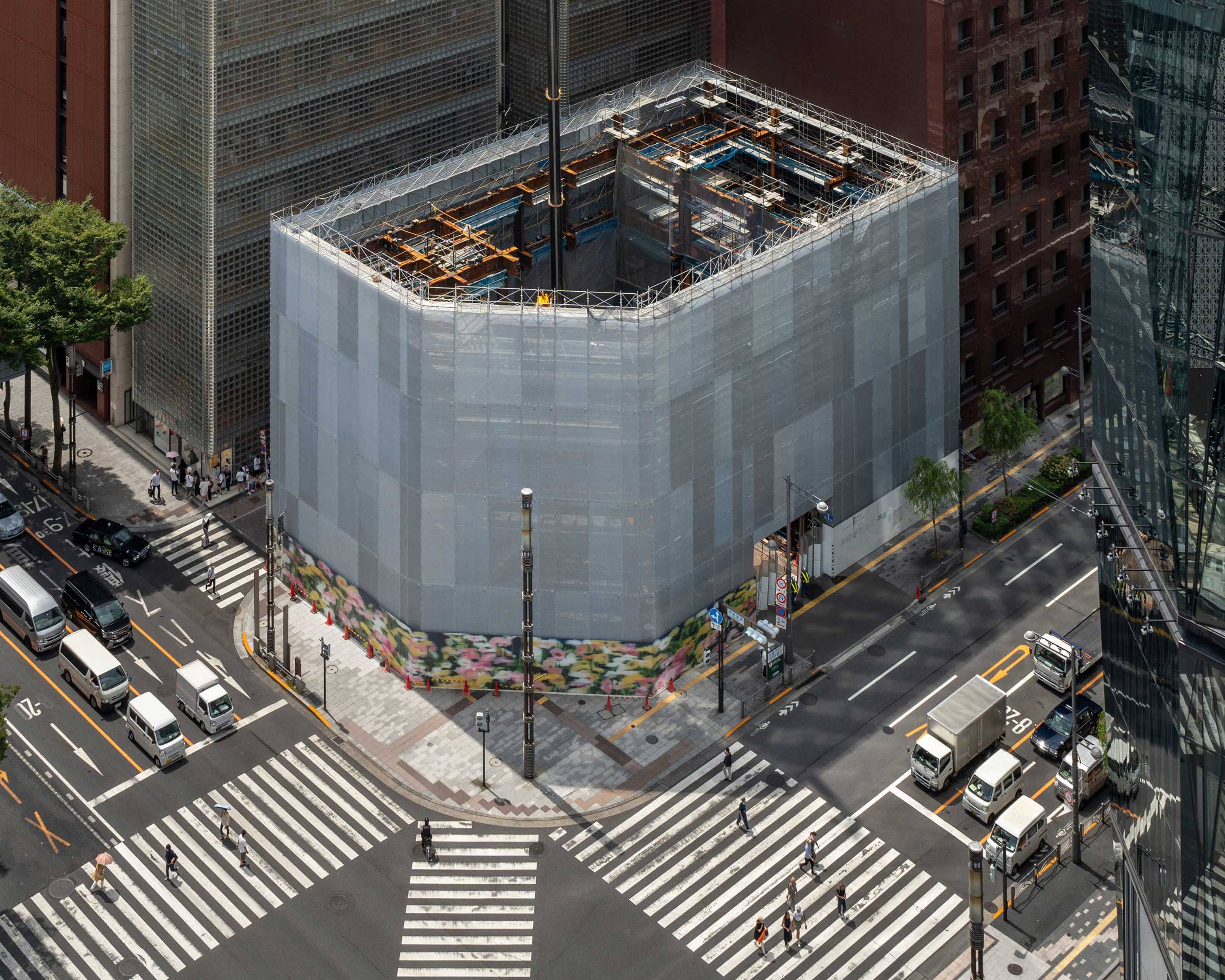 Bird’s eye view. Surrounding buildings at Sukiyabashi Crossing and Ginza Sony Park, covered in its temporary construction fence up to the fifth floor.