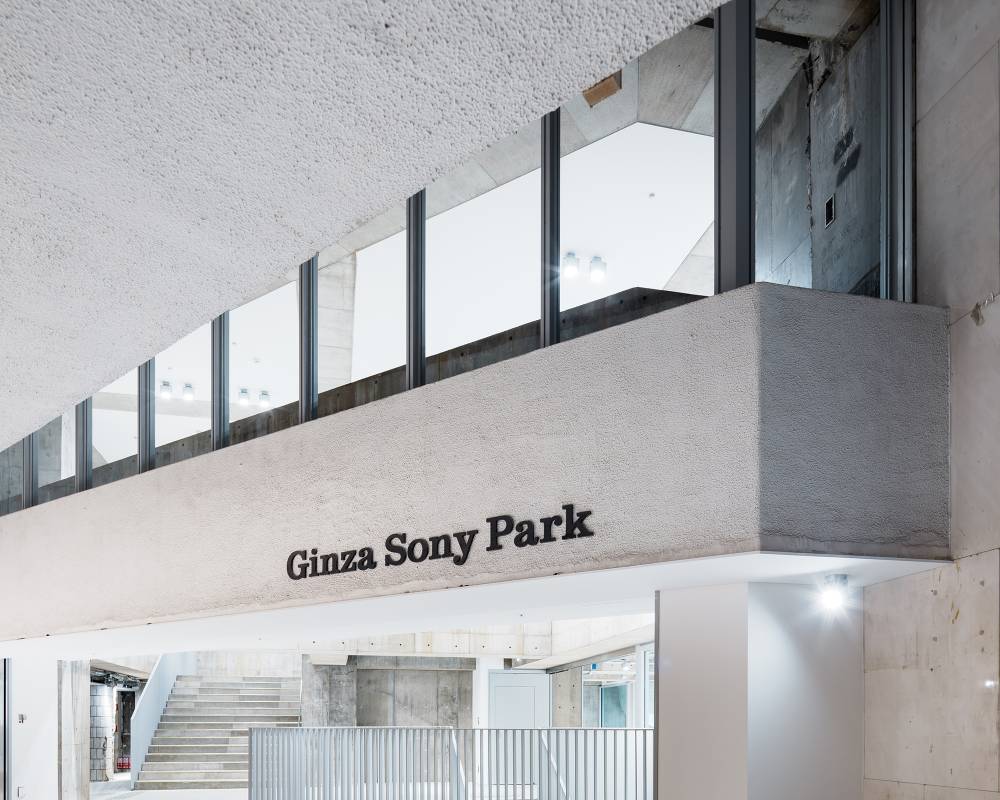 Exterior of basement floor. The building frame where the building connects to the underground concourse still retains the “Ginza Sony Park” logo.