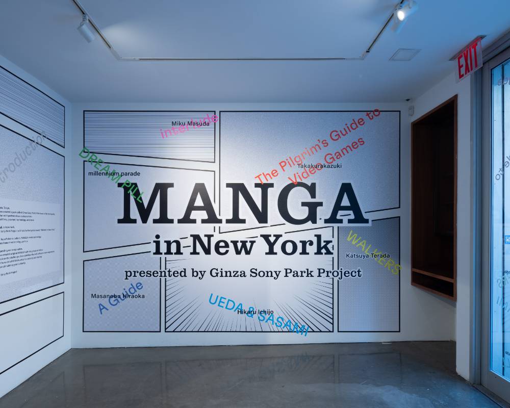 Interior. The main “MANGA in New York” visual is displayed prominently on the wall.