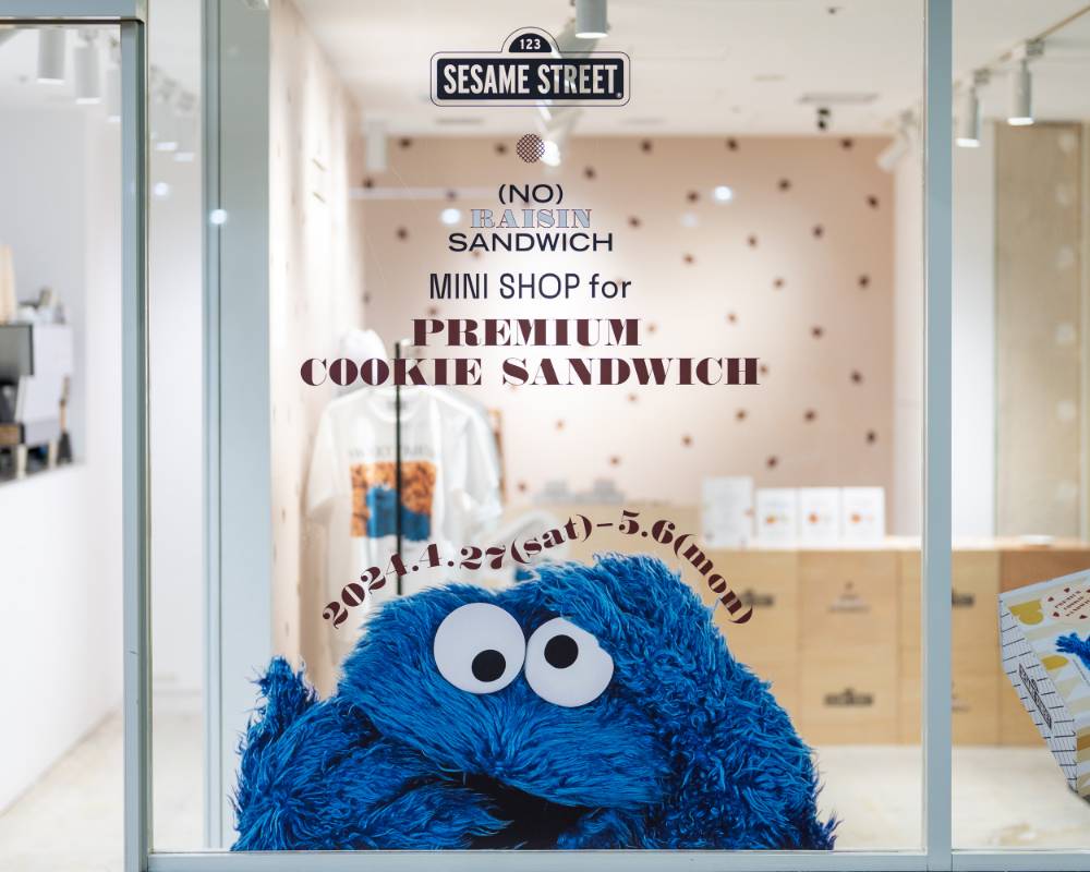 Exterior. The glass window is decorated with the main visual of the program, the Cookie Monster.